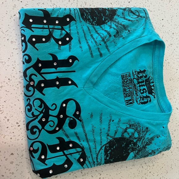 Size medium rush shirt . - Picture 9 of 9